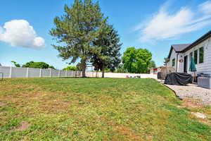 View of fenced backyard
