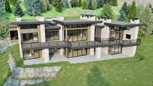 Rear view of property with a patio area, stone siding, and a yard