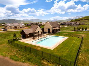 View of swimming pool featuring a mountain view and a residential view