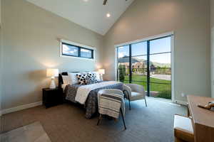 Carpeted bedroom featuring high vaulted ceiling, recessed lighting, and access to outside