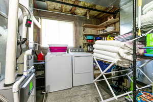 Laundry area featuring washing machine and dryer