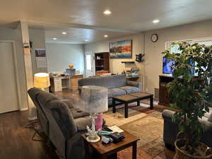 Living room featuring recessed lighting and wood finished floors