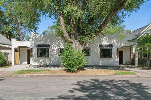 View of front of property featuring stucco siding