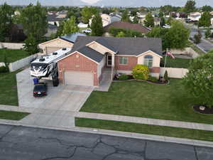 Aerial perspective of suburban area featuring a mountain backdrop