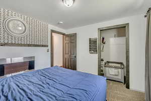 Bedroom featuring carpet flooring