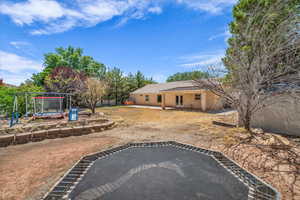 View of yard with a patio area and french doors