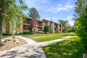 Surrounding community featuring a lawn