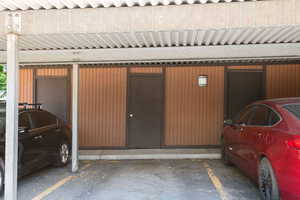 Garage featuring covered parking