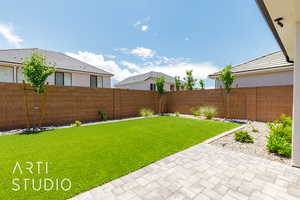 View of yard with a patio area