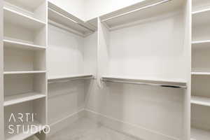 Walk in closet with carpet