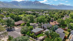 Aerial view of residential area with a mountain backdrop
