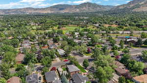 Aerial perspective featuring a mountain backdrop