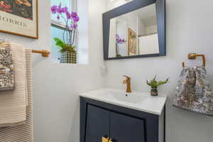 Full bathroom featuring vanity