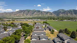 View of mountain backdrop with nearby suburban area