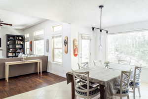 Dining room featuring tile patterned flooring, baseboards, and ceiling fan