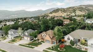 View of mountain background featuring nearby suburban area