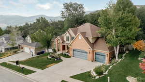 View of subject property featuring a mountain backdrop