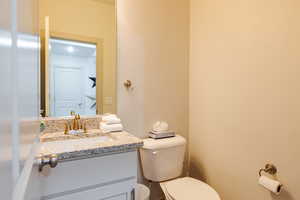 Bathroom with vanity and toilet