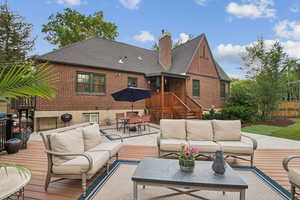 Deck with an outdoor hangout area and outdoor dining area