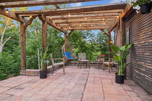 View of patio featuring a pergola