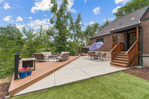 View of patio featuring an outdoor living space and a wooden deck