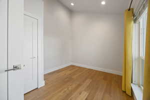 Spare room with recessed lighting and light wood finished floors