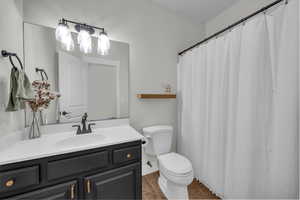 Full bath featuring vanity and tile patterned floors