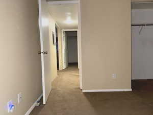 Corridor with carpet floors
