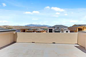View of patio featuring a mountain view and a residential view