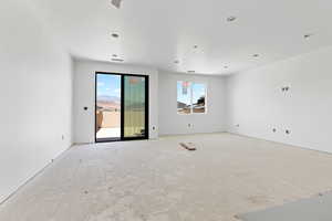 Unfurnished room with healthy amount of natural light