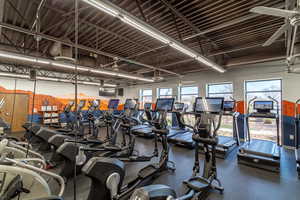 Exercise room with ceiling fan