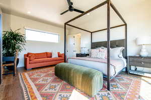 Bedroom with wood finished floors, recessed lighting, and a ceiling fan
