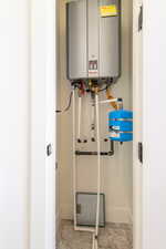 Utility room with tankless water heater