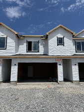 Property in mid-construction with driveway