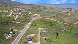 View of property location featuring "APPROXIMATE" property boundaries highlighted and a water and mountain view