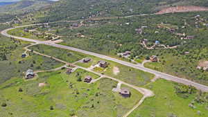 Aerial overview of property's location with a mountainous background