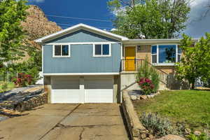 View of front of home with a nicely landscaped front yard
