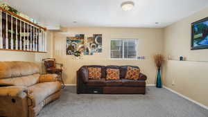 Living room with carpet floors