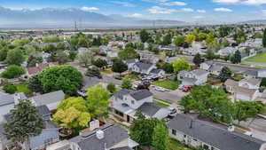 Aerial view of residential area with a mountain backdrop