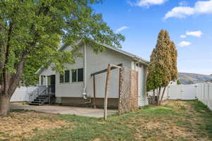 View of home's exterior with a fenced backyard