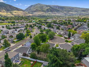 Aerial view featuring a mountain backdrop