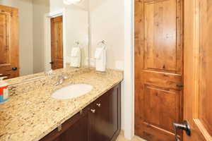 Guest Half Bath with vanity and toilet