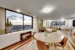 Dining space featuring light wood finished floors
