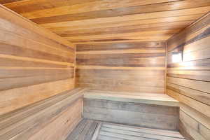 Relaxing sauna with wood ceiling and wood walls