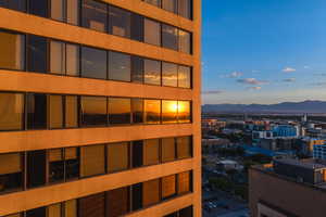 View of building exterior featuring a mountain view and a city view