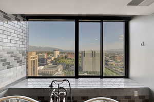Kitchen featuring a mountain view and a city view