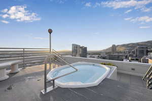 View of swimming pool featuring a city view and a mountain view