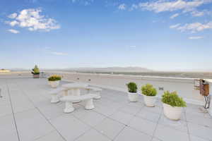 View of patio / terrace with a mountain view