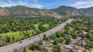 Aerial perspective of suburban area with mountains