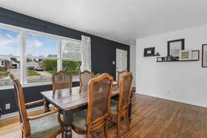 Dining room featuring wood finished floors